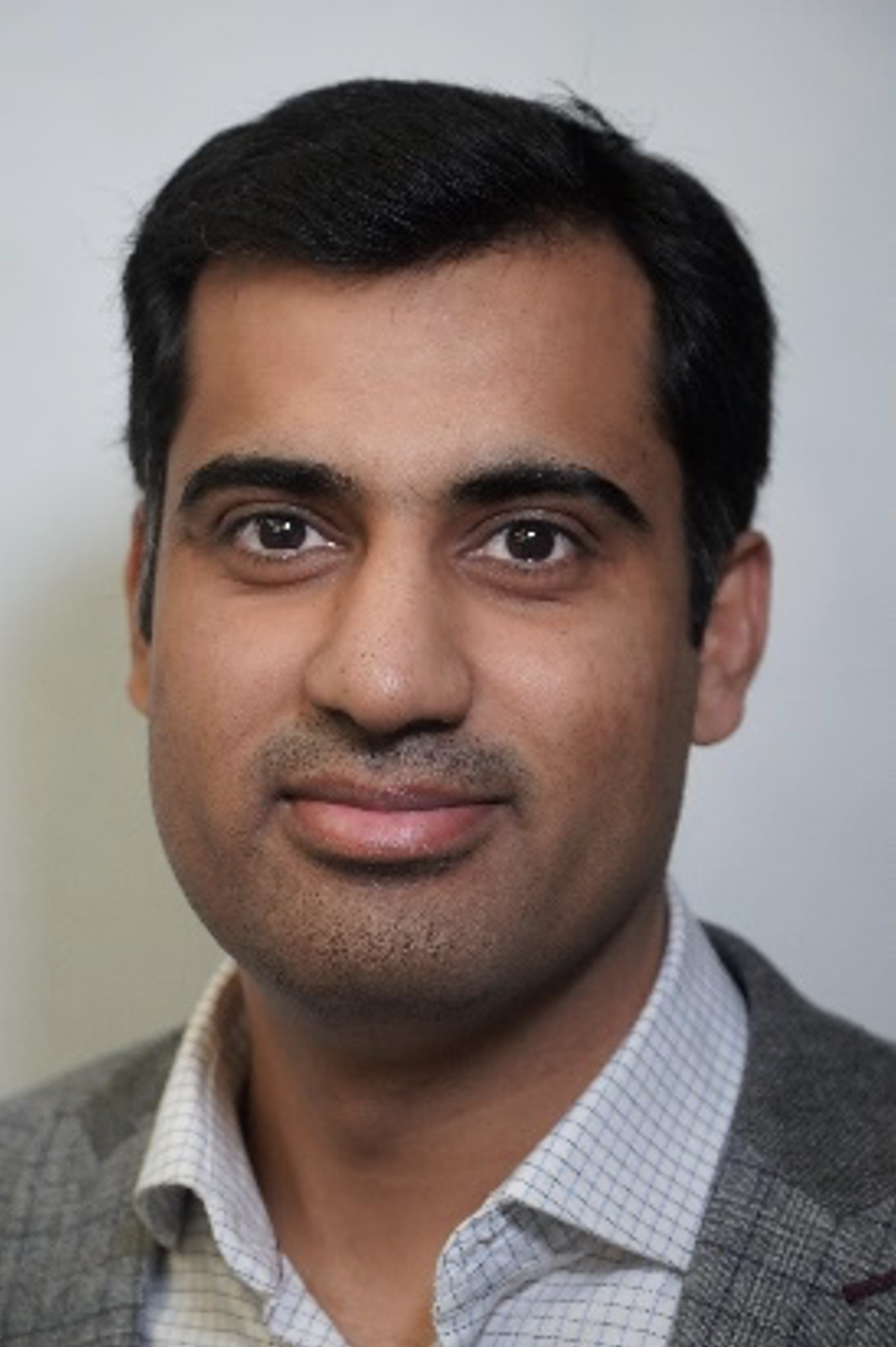 Headshot of Dr Janjua